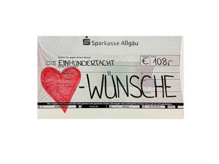 Unser Spendenscheck an Herzenswünsche Allgäu e.V.